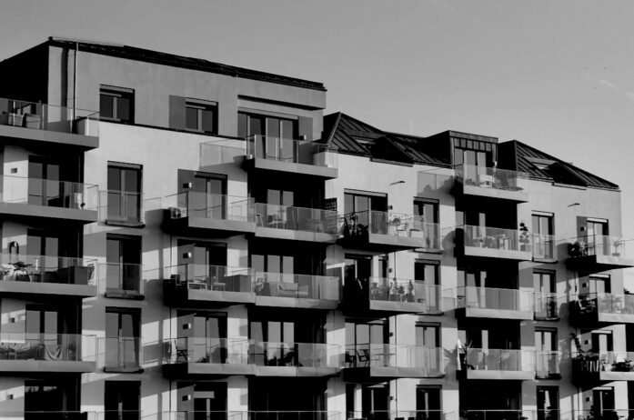 black and white apartment building.